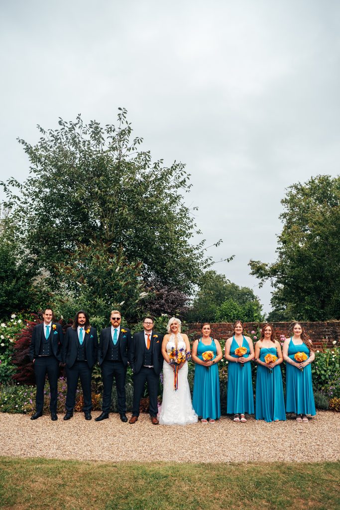 bride and groom with wedding party