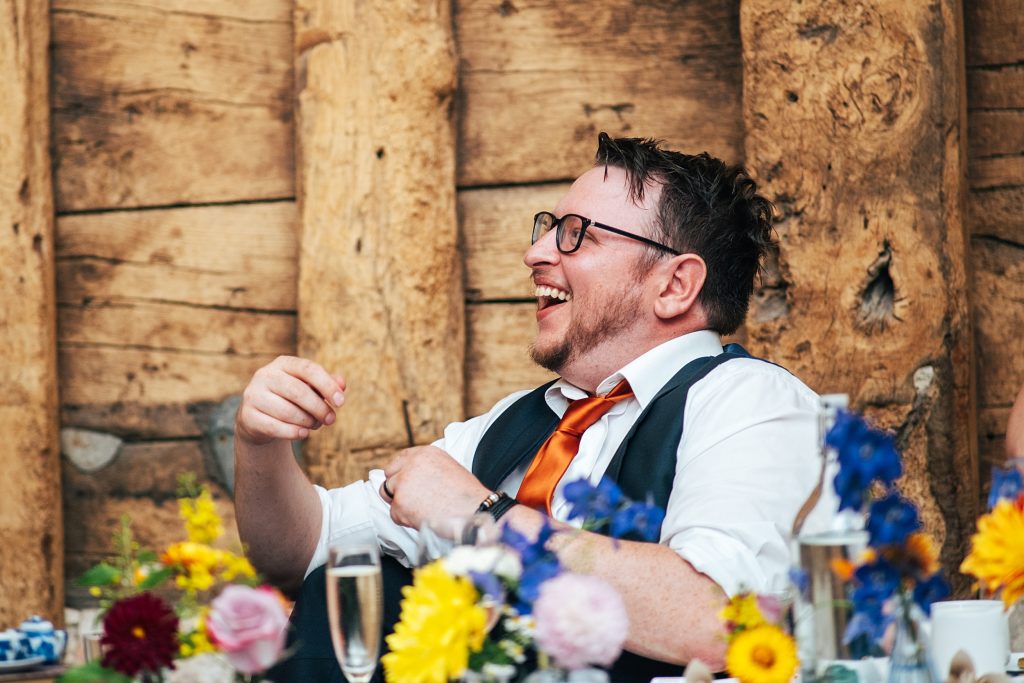 groom laughs at speeches