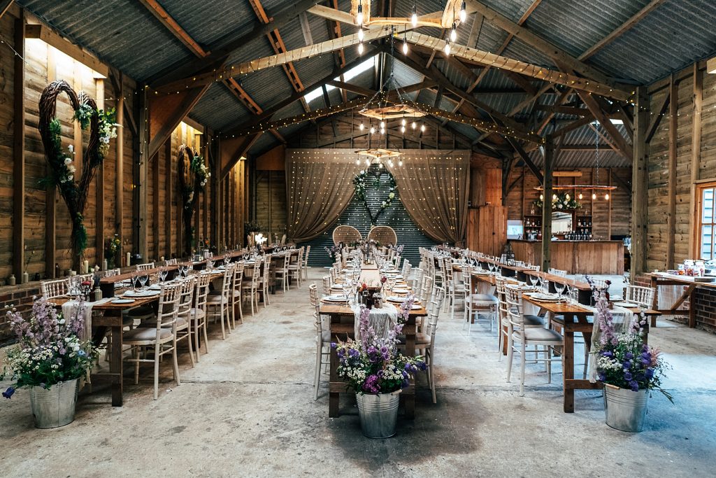 captains wood barn set up for wedding breakfast