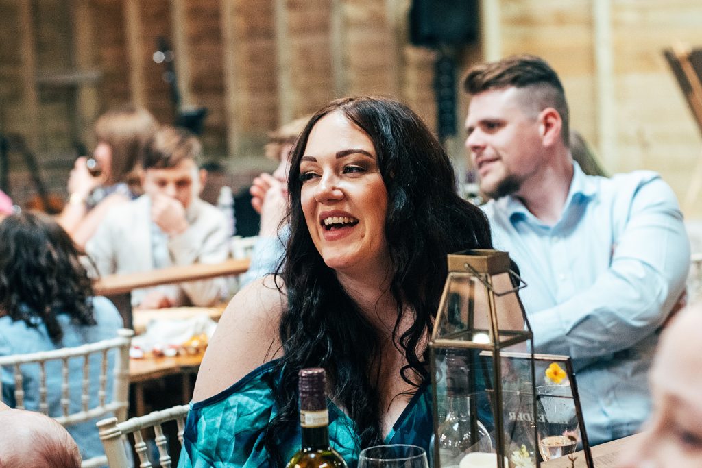 wedding guest laughs at speeches