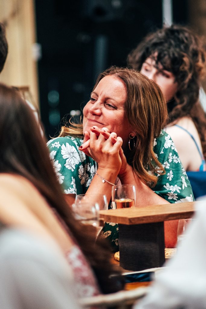 wedding guest laughs at speeches