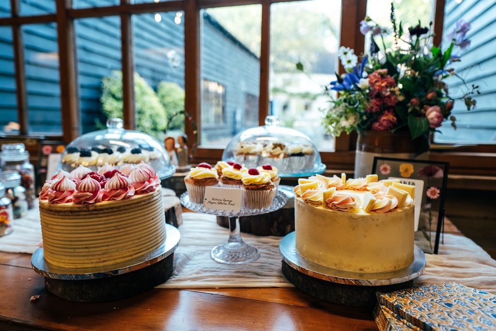 table of cakes at a wedding