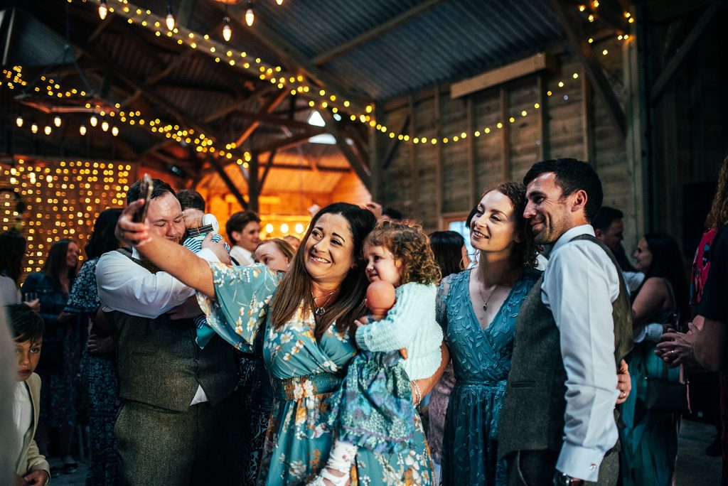 wedding guests take selfie