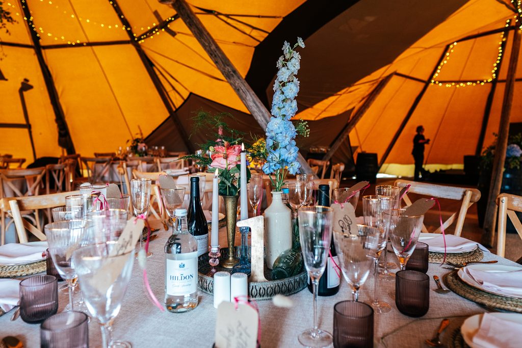wild flowers on table in tipi