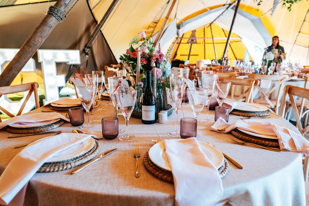table set up in tipi for wedding