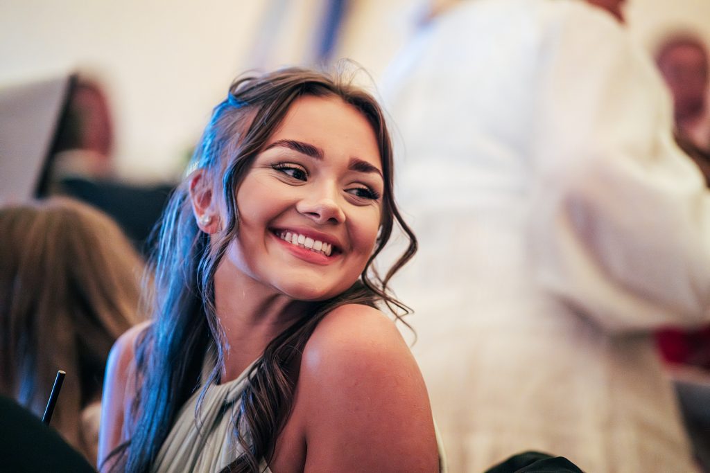 guest laughs at speeches
