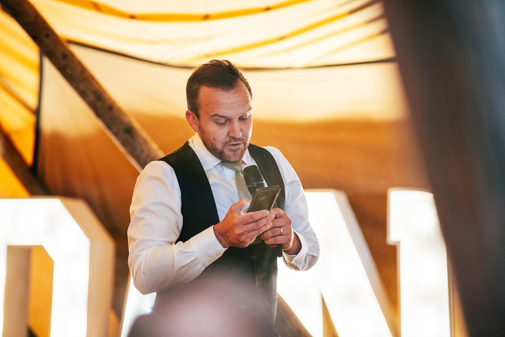 best man gives speech in a tipi