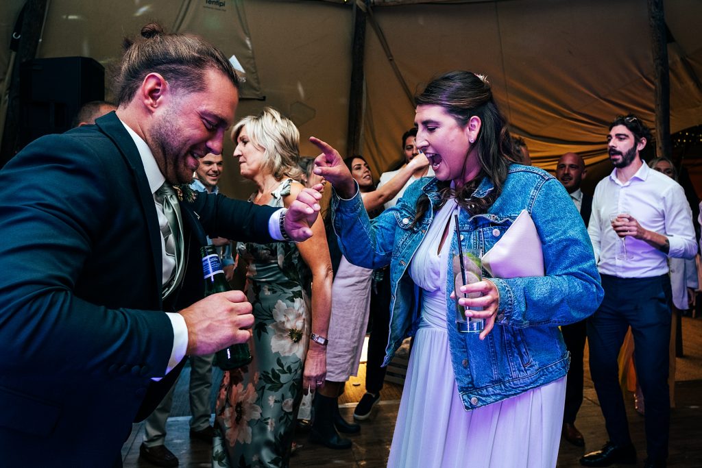 wedding guests on dance floor in tipi