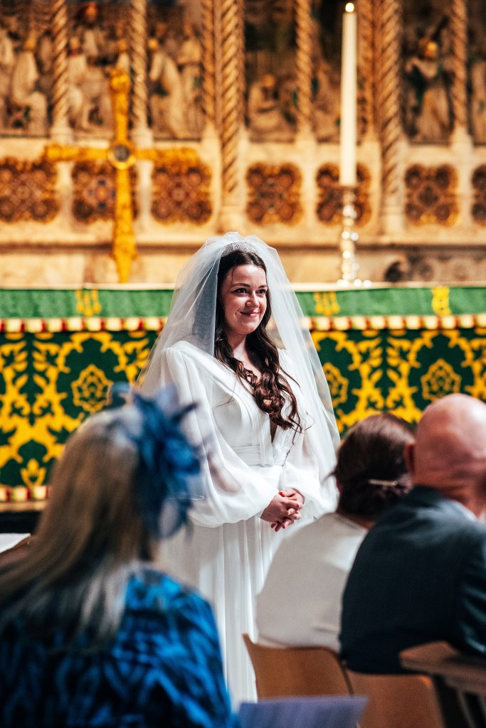 smiling bride at Ely cathedral