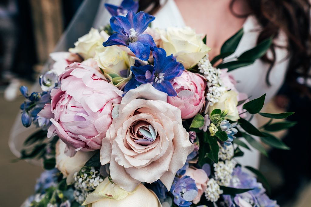 confetti stuck in roses in bouquet