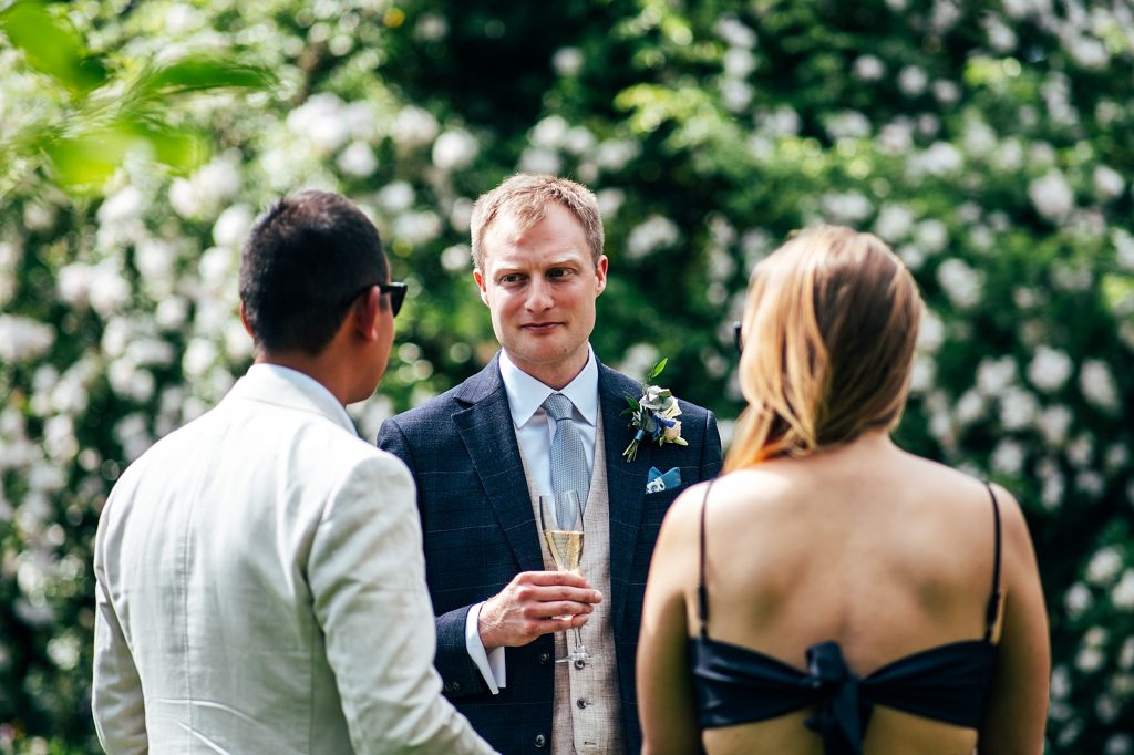wedding guests enjoy garden reception