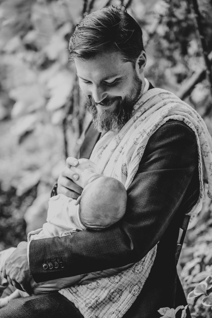 wedding guest feeds a baby