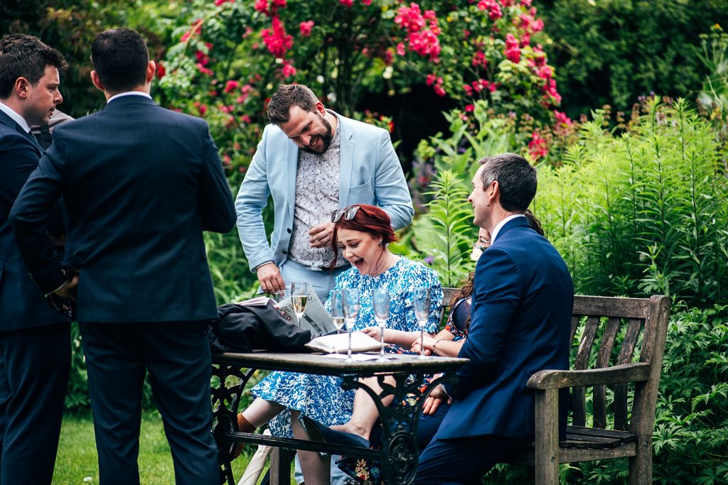 wedding guests enjoy garden reception