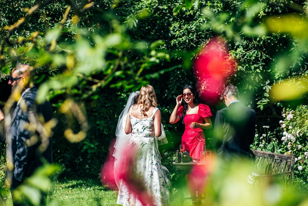 wedding guests enjoy garden reception