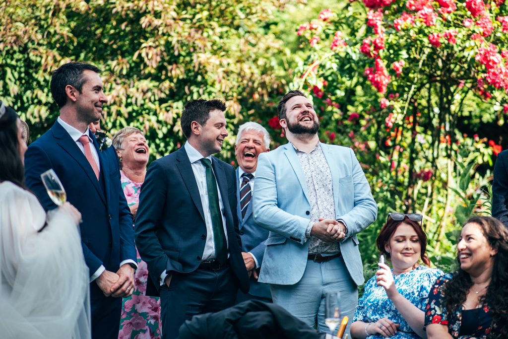guests enjoy wedding speeches