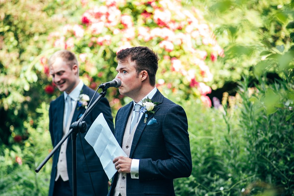 guests enjoy wedding speeches