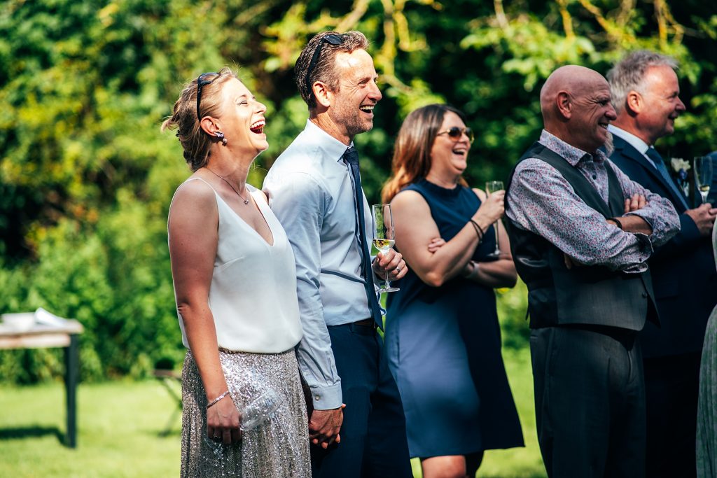 guests enjoy wedding speeches