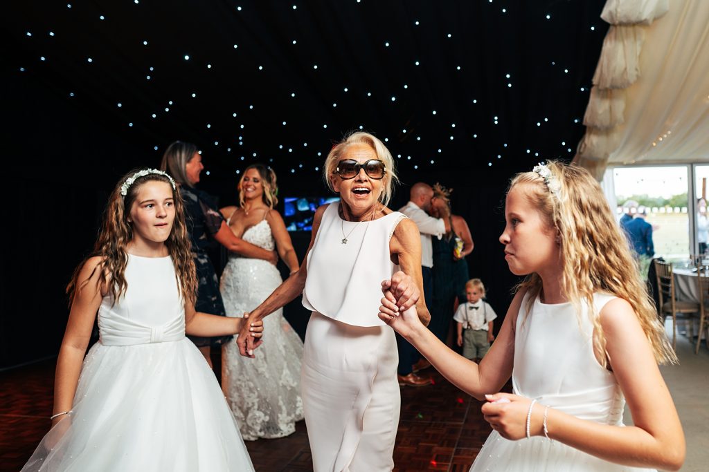 wedding guests on dance floor