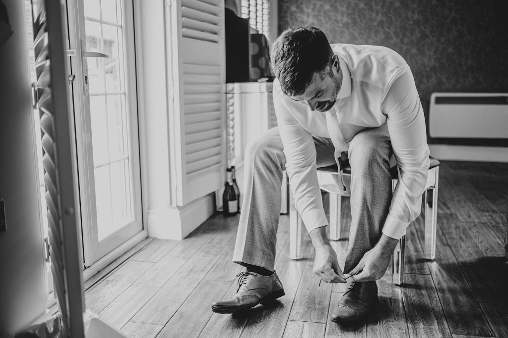 groom ties shoes