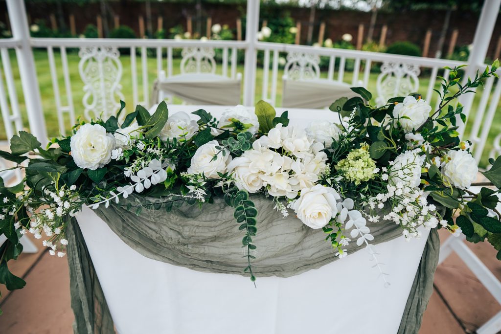 white floral ceremony display
