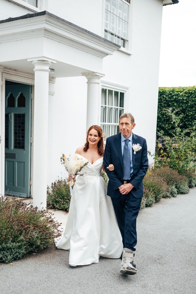 dad walks bride to ceremony