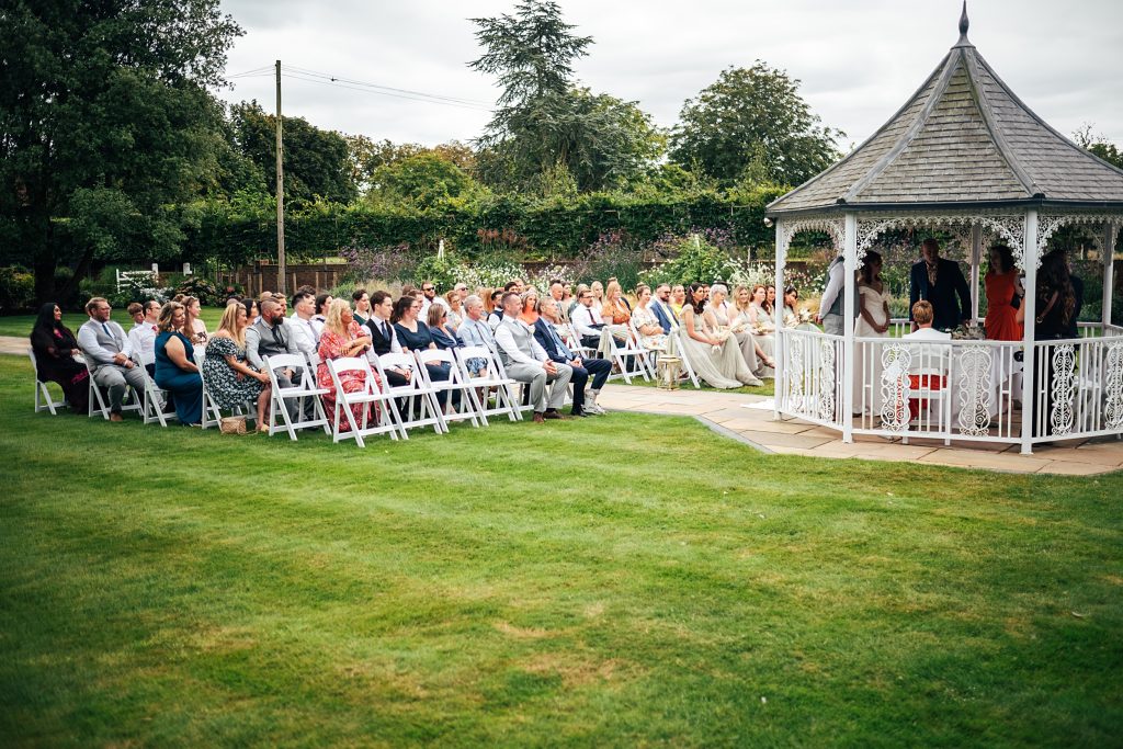 wide view of outdoor wedding ceremony