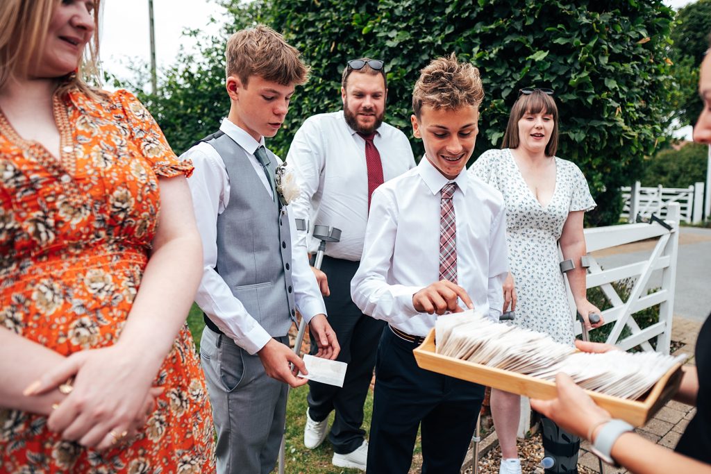 guests take confetti