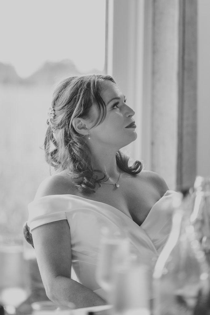 bride looks at her dad during speech