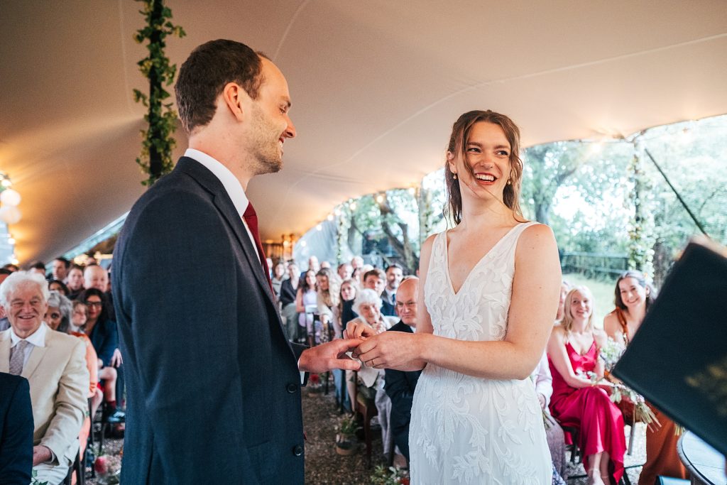 bride and groom exchange ring