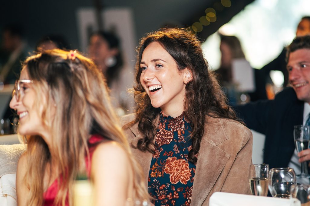 wedding guest laughs at speech