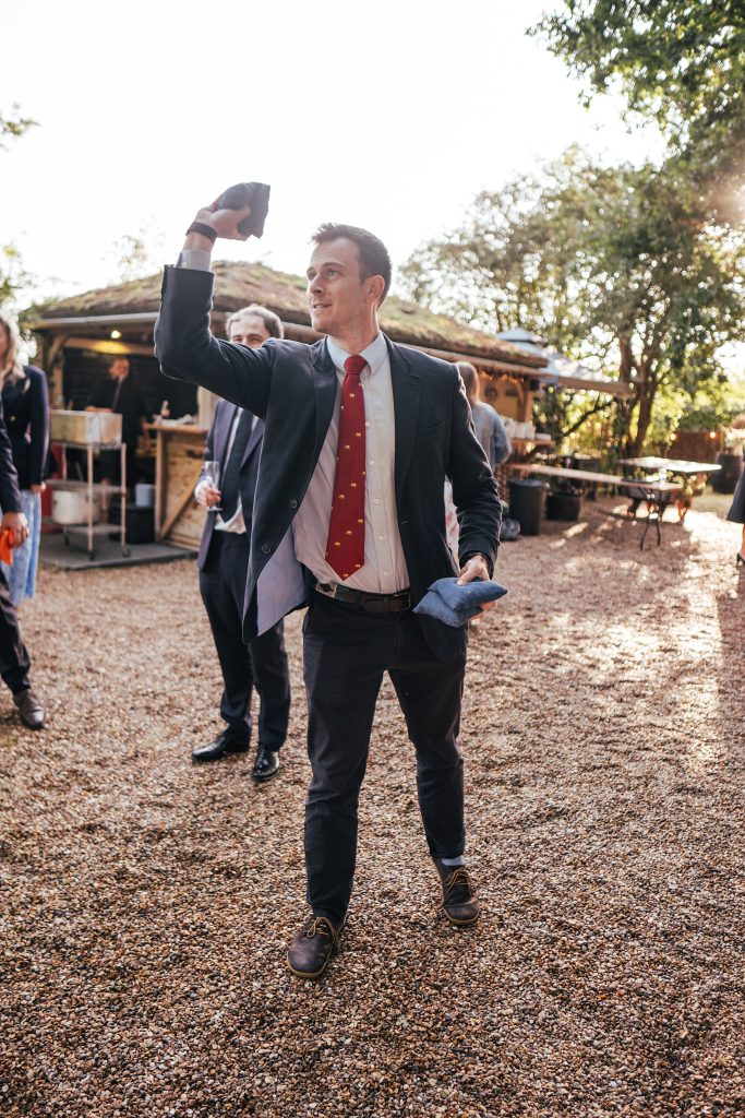 wedding guest throws bean bag