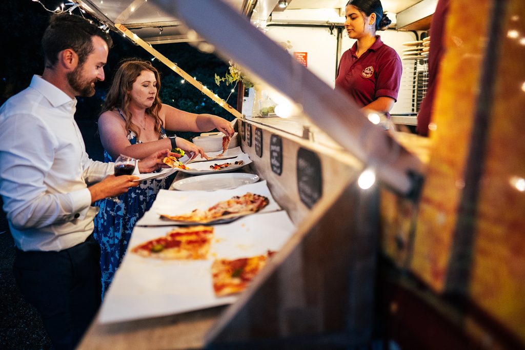 wedding guests at pizza truck