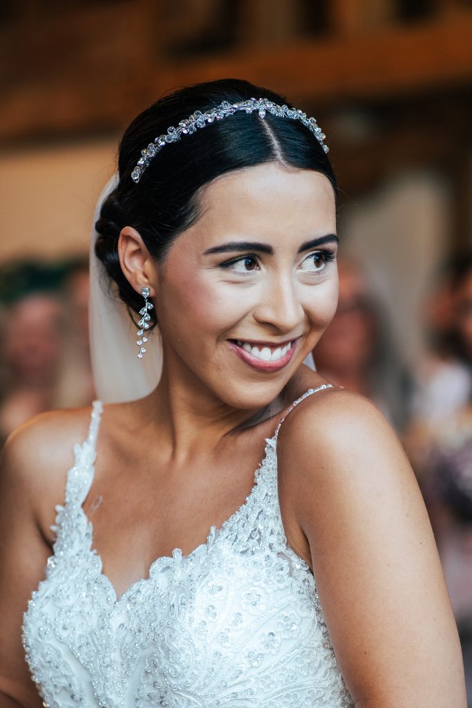 smiling bride during ceremony