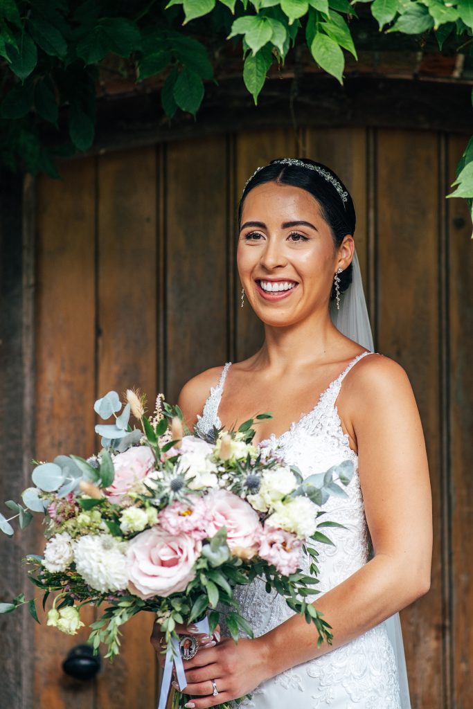 laughing bride in doorway