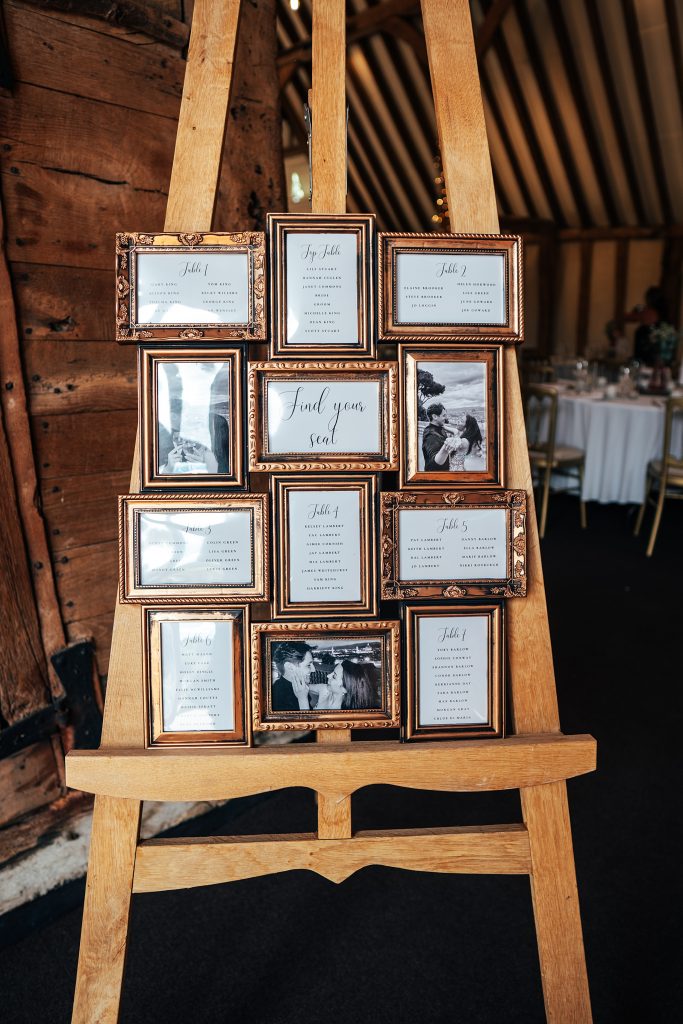 table plan with photos in antique frames