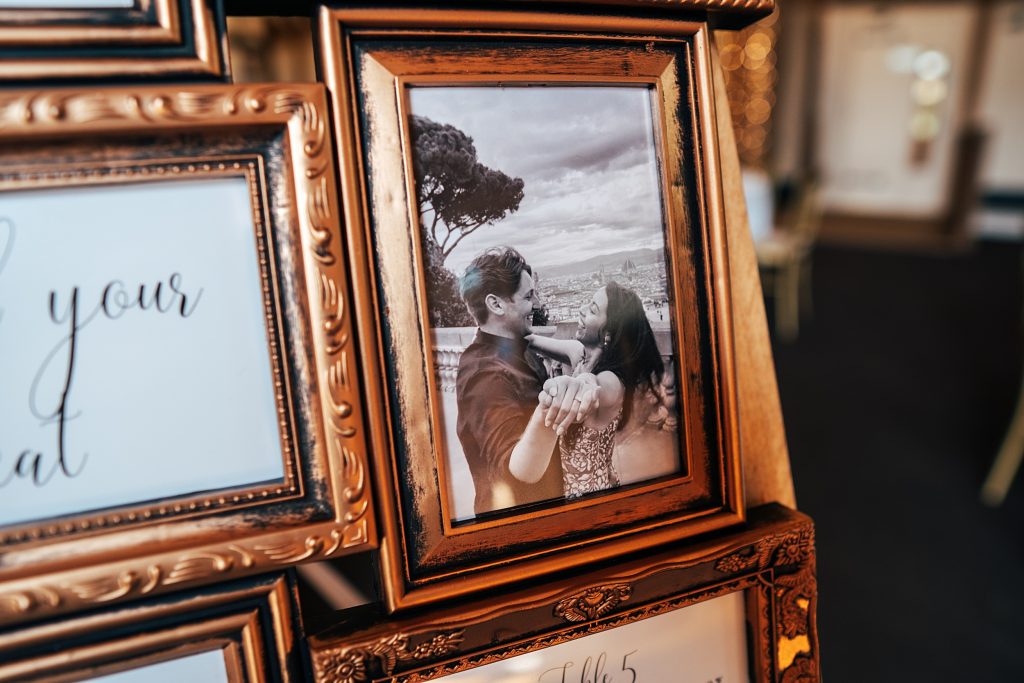 close up of photo of bride and groom in antique frame