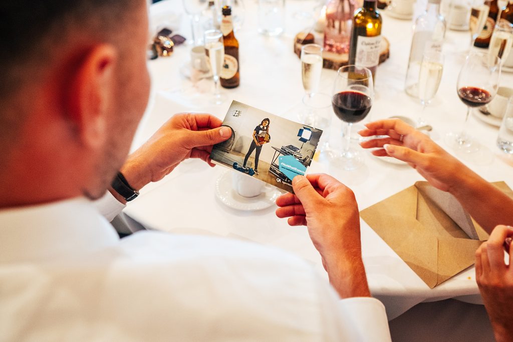 view from over guests shoulder of photo shown during speeches