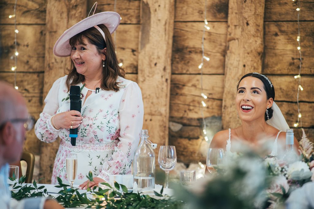 bride laughs at mum's speech