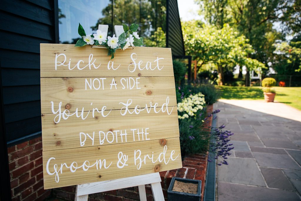 pick a seat not a side wedding sign