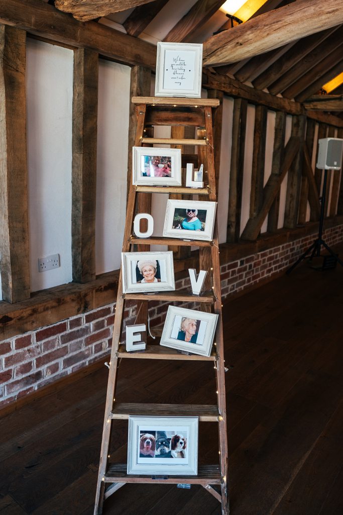 ladder with family photos