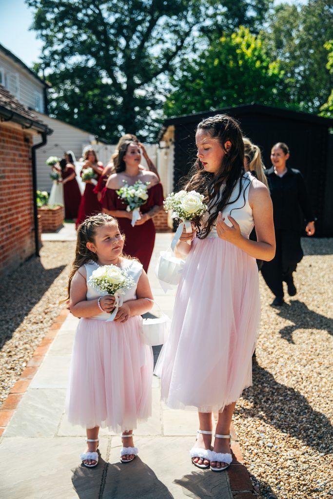 flower girls line up ready for ceremony