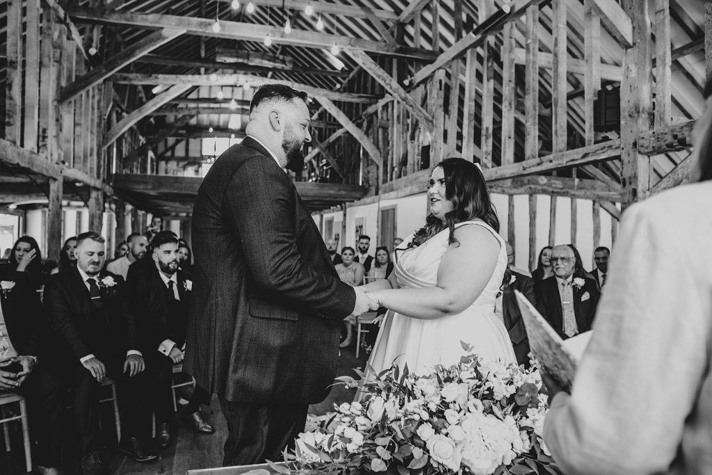bride and groom take vows