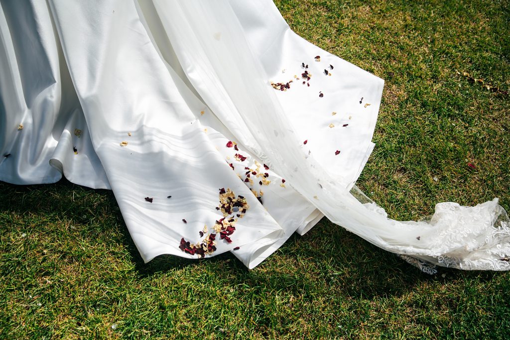confetti on brides dress