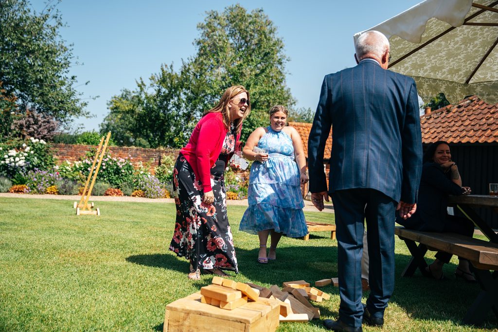 guests play Jenga