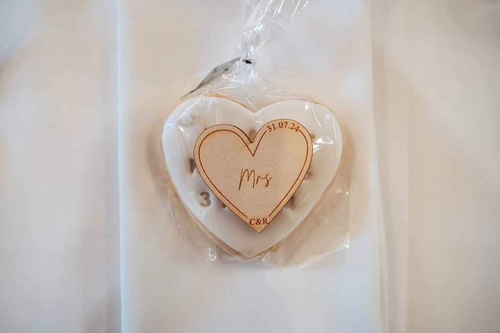 white iced cookie favour