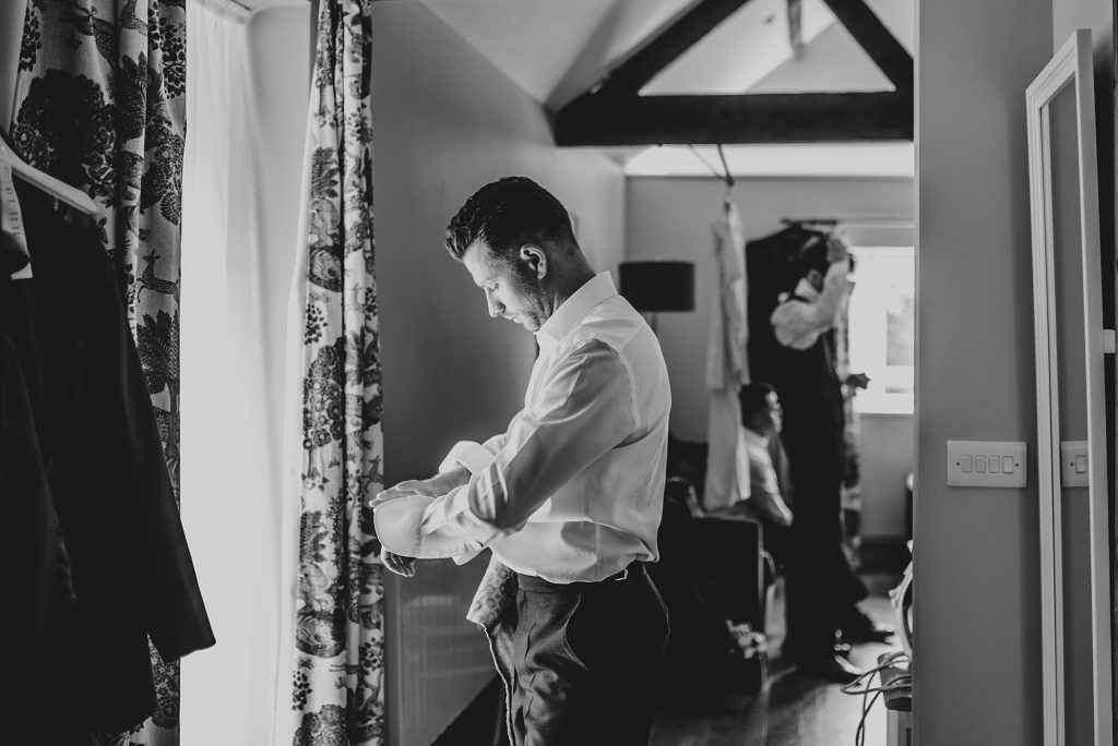Outdoor Maidens Barn wedding with Singing Waiters Best Essex Wedding Photographer