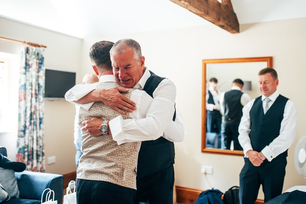 Outdoor Maidens Barn wedding with Singing Waiters Best Essex Wedding Photographer