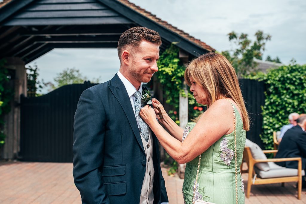 Outdoor Maidens Barn wedding with Singing Waiters Best Essex Wedding Photographer
