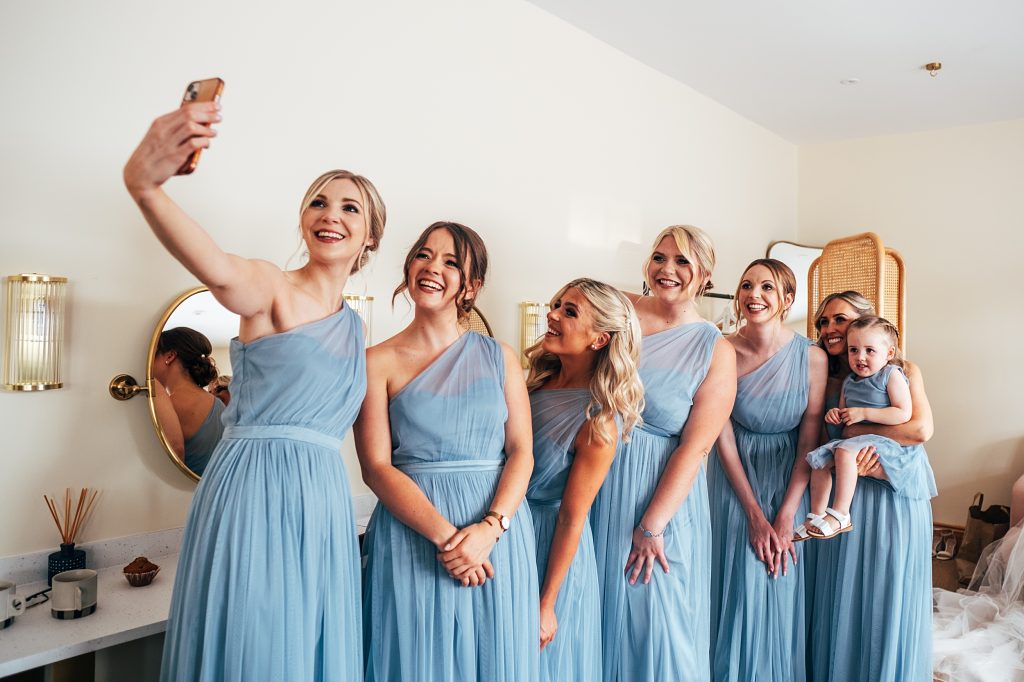 Outdoor Maidens Barn wedding with Singing Waiters Best Essex Wedding Photographer