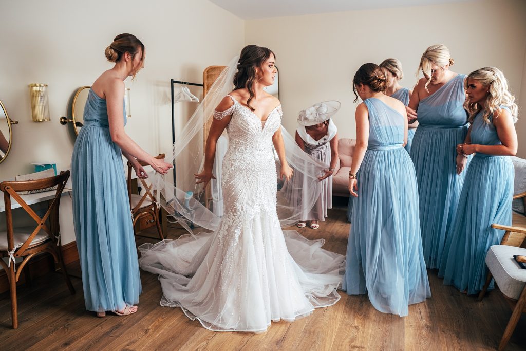 Outdoor Maidens Barn wedding with Singing Waiters Best Essex Wedding Photographer